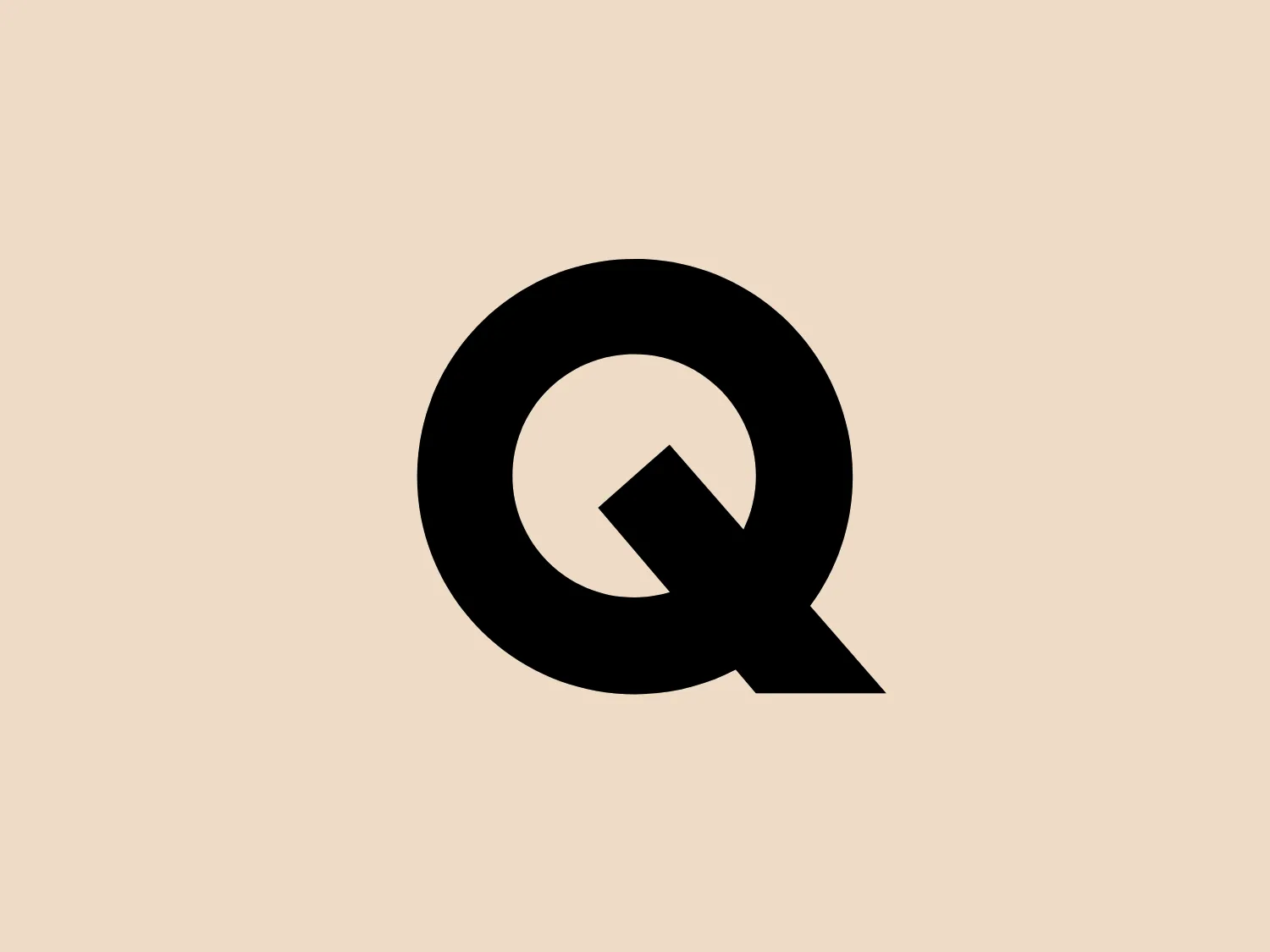 The logo in the image features a bold, stylized letter 'Q' in black. The design is minimalist and modern, with a geometric quality. The 'Q' is constructed from a perfect circle and a tail that extends out from the bottom right, creating a sense of balance and solidity. The circle has a clean cutout triangular shape within it, breaking the space and giving an impression of depth and dimension. It's a strong and stark design that would stand out well against a clean and subtle background.