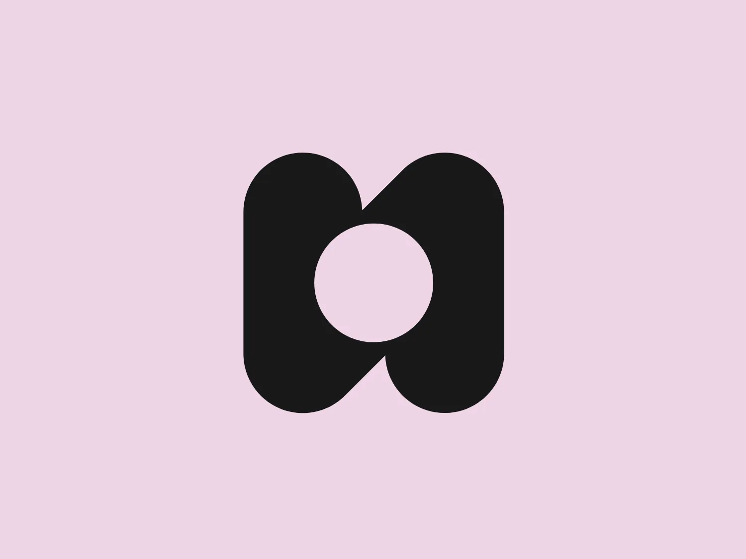The logo for Nomics flaunts a contemporary and assertive visual with a lively magenta color scheme. Featuring a stylized "N," the design exudes a seamless, loop-like impression with inward-curving ends. Its symmetrical and sleek design, coupled with rounded edges, establishes a sense of gentleness and accessibility. Notably, the negative space within the "N" cleverly shapes an oval, contributing depth and captivating visual allure. Overall, the logo exudes a professional yet playful essence.