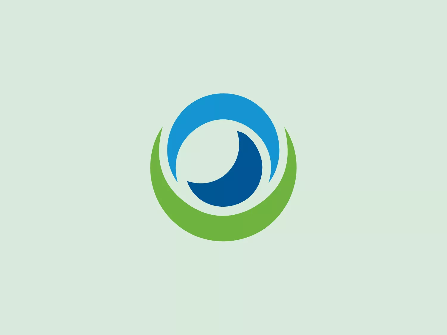 The Orban logo showcases a stylized spherical form composed of swirl-like elements. At its core is a dark blue circle, conveying unity or a central focus point. Surrounding it are two swooping shapes in a lighter shade of blue, creating a sense of rotation or orbit. Below these shapes is a bold green arc, symbolizing growth, vitality, or foundation. The design is modern, dynamic, and clean, conveying movement and harmony.