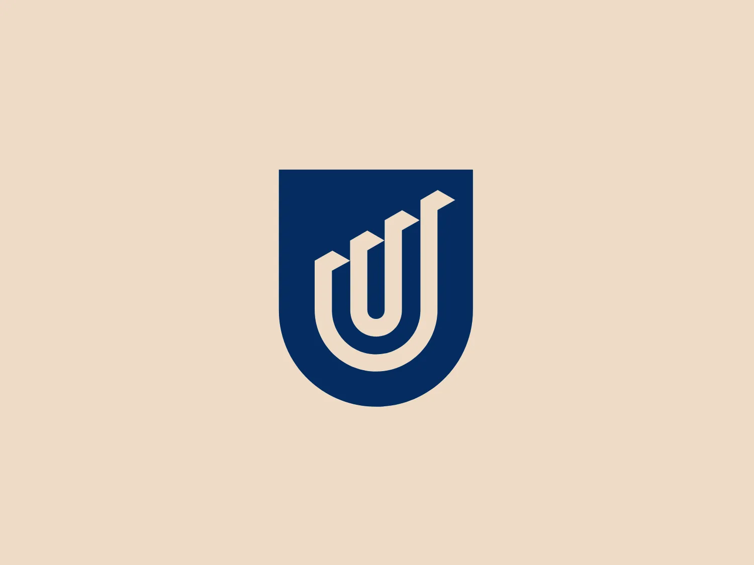The "University of South Australia" logo features a highly stylized shield in a deep blue color, with a white abstract design within it. The design incorporates elements resembling a letter 'U' and ascending bars, conveying a sense of growth. The overall aesthetic is modern and minimalistic, with strong lines and a bold presence.