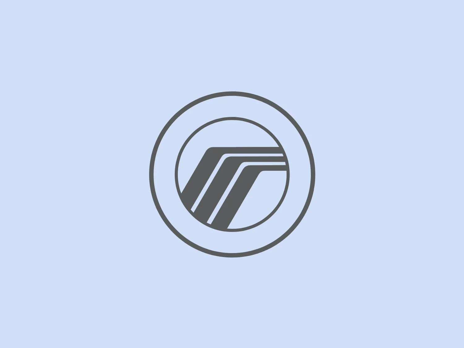 The Mercury logo is a modern, minimalist design comprised of a circular frame surrounding an abstract graphic that resembles a road or pathway leading into the distance or perhaps pages of a book with a layered effect. The design utilizes a monochromatic color scheme with varying shades of gray, providing a sleek and professional aesthetic. The use of negative space and perspective in the design gives it a dynamic feel, suggesting movement, progress, or a journey. The geometric lines are clean and sharp, adding to the contemporary look of the logo.
