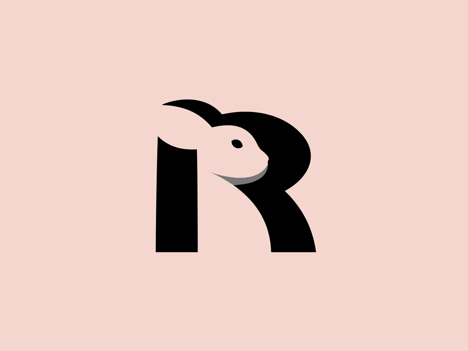 The PadRabbit logo features a stylized, abstract design of a rabbit cleverly incorporated into the negative space of a bold, black letter "R." The black and white color scheme is striking and minimalist, highlighting the clever use of space within the letter to suggest the form of the rabbit, complete with a suggestion of an eye, ears, and head. The overall design aesthetic is modern, clean, and would be highly recognizable even from a distance. The design effectively captures attention through its simplicity and the surprise element of the hidden animal figure.