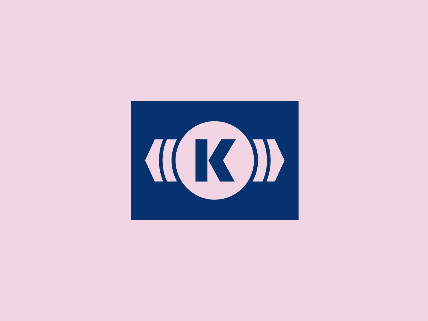 The Knorr Bremse logo features a crisp, minimalist design with a bold, capital letter "K" centered within a circle. The letter is flanked by two symmetrical, abstract, horizontal shapes that suggest motion or sound waves. The logo is rendered in a solid, white color and set against a deep blue rectangular background. This design communicates a sense of technology or audiovisual identity, indicating a potential connection to media, sound, or communications fields.