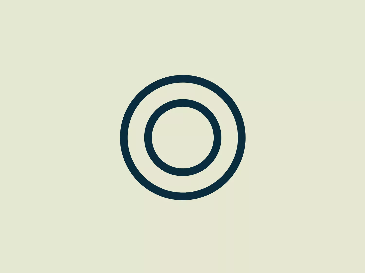 The Fos Cafe logo is composed of a thick outer ring and a concentric inner circle, both rendered in a deep navy blue color. This simple, modern design features clean lines and a minimalist aesthetic, with the negative space between the two shapes emphasizing the geometry. There's a substantial contrast between the boldness of the lines and the plainness of the overall shape, which makes the logo versatile and easily scalable. This design could be interpreted as abstract or as a stylized letter or symbol depending on its context.