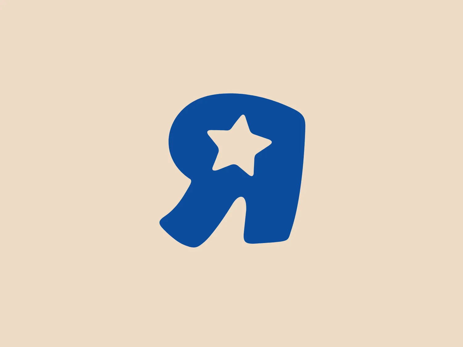 The Toys R Us logo depicts a stylized, lowercase letter 'r' in a bold and friendly font. Colored in a solid, vivid shade of blue, it features a clean, white star shape in its center, adding a sense of fun or excellence to the overall design. The rounded corners of the 'r' contribute to a soft and approachable look.
