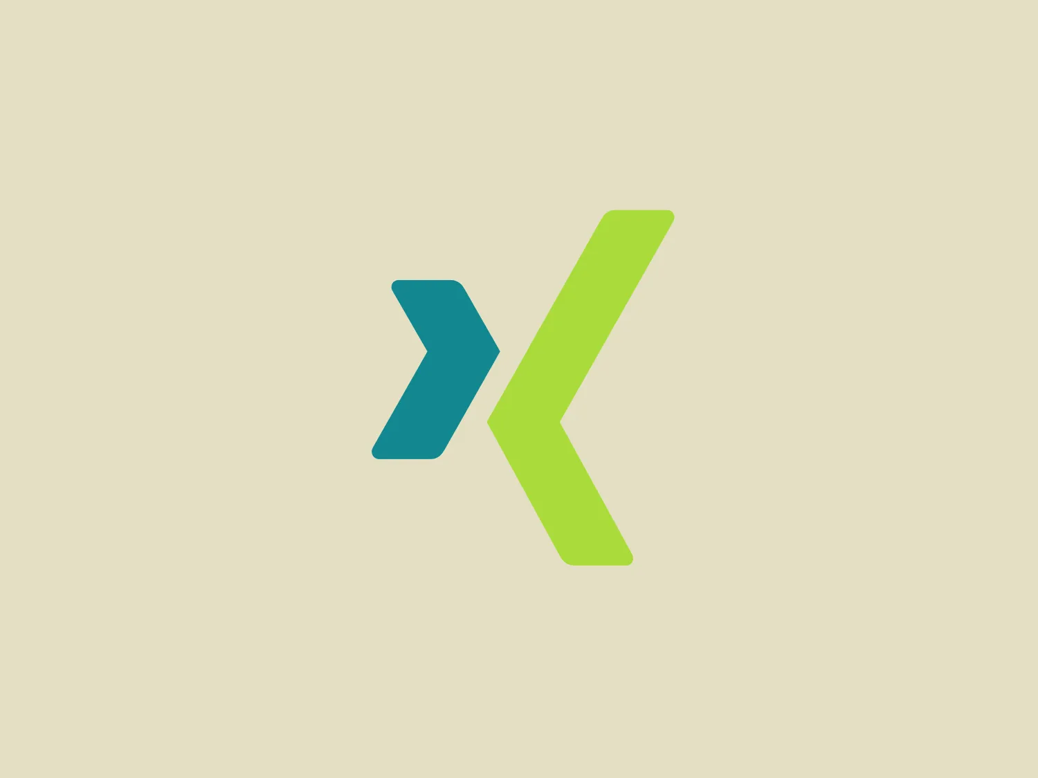 The Xing logo showcases two interconnected, angular shapes resembling arrows or chevrons. The left shape is a deep teal blue with a lighter edge, evoking dimension, while the right shape is a vibrant lime green, imparting a sense of energy and forward motion. This modern design symbolizes movement and progress, using contrast between the colors to create a bold, simplistic look. A neutral background is recommended to complement the logo's vibrant colors without competing for attention.