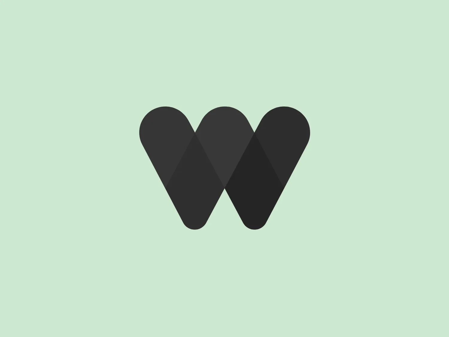 The WCS logo features a stylized 'W' shape comprised of three overlapping, rounded peaks, each with a distinct gradient. The left peak gradient flows from teal to a dark forest green, the middle transitions from the same forest green to a more moderate olive green, and the right peak morphs from olive green into a muted blue. The aesthetic is modern and minimalist, with clean lines and the use of gradient colors adding depth and movement to the design. The logo conveys a sense of dynamism and interconnectedness through its overlapping elements.