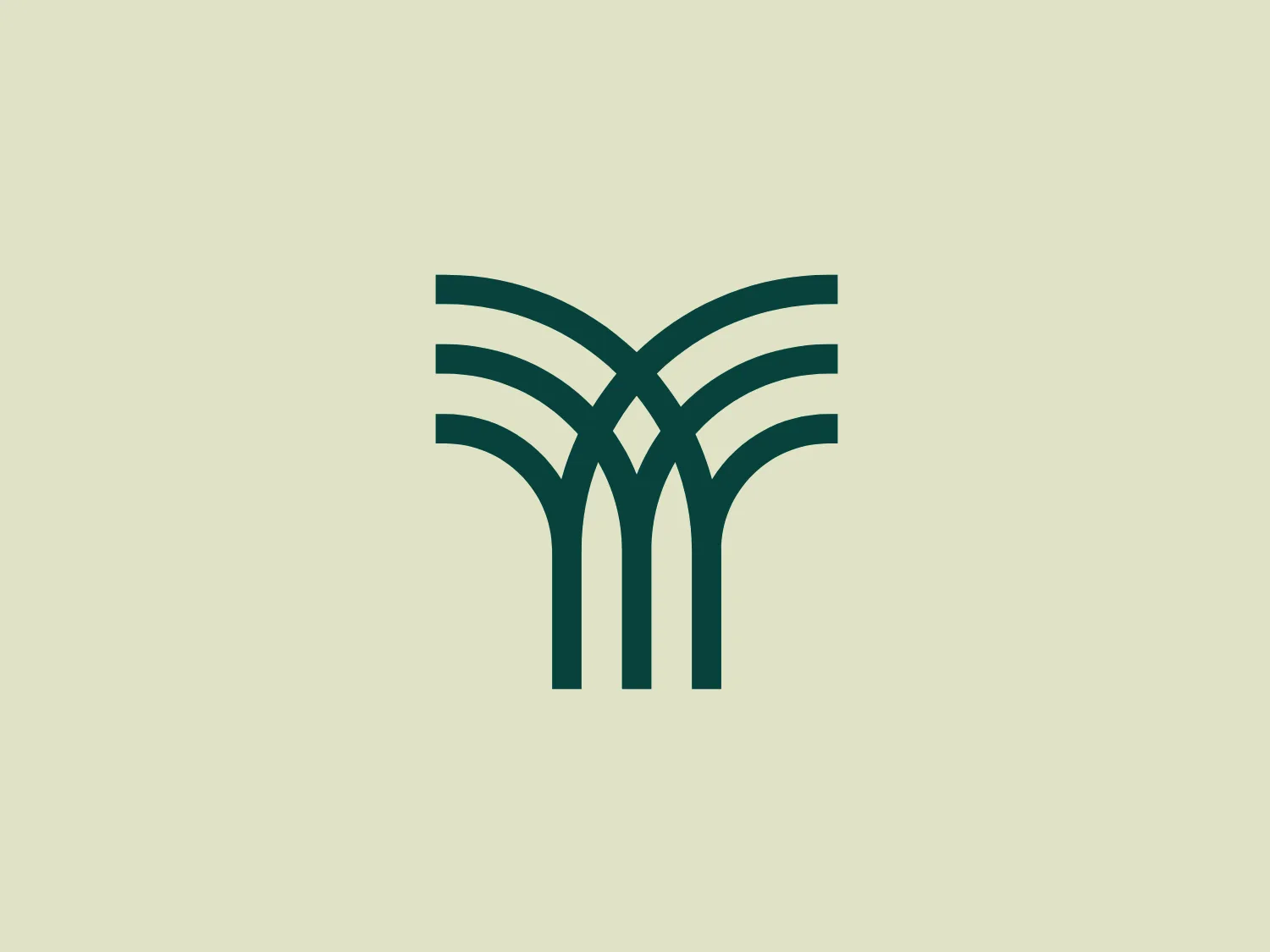 The Universidad Tecmilenio logo features a stylized, abstract design with a resemblance to a tree or plant. It consists of vertical lines that divide and curve outward into branches or leaves, creating an organic and symmetrical pattern. The logo is monochromatic, using a shade of dark teal or green, which gives it a professional and ecological feel. The lines are bold and evenly spaced, contributing to its modern look. The negative space between the branches is well balanced, providing a sense of harmony and growth.