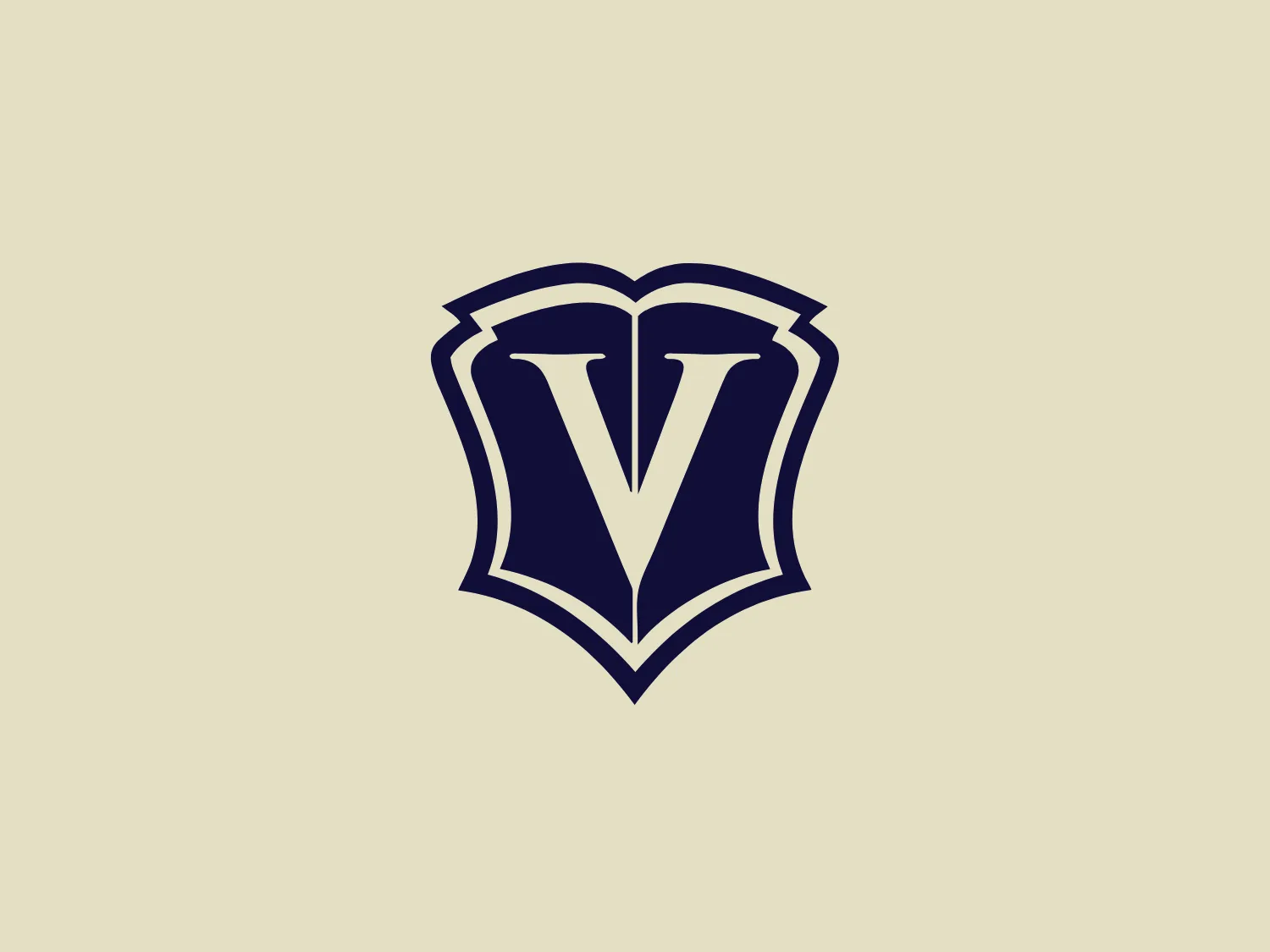 The Veritas Prep logo features a stylized letter “V” centrally placed within a shield-like emblem, featuring bold, crisp edges that suggest precision and strength. The emblem and the "V" are both rendered in a deep navy blue, conveying a sense of professionalism, power, and reliability. The overall design aesthetic is modern and minimalistic, with a touch of elegance due to the serifs at the top of the “V” and the use of negative space that defines the letter within the shield. The shield itself has three layers, adding a sense of depth to the design without cluttering it with unnecessary details.
