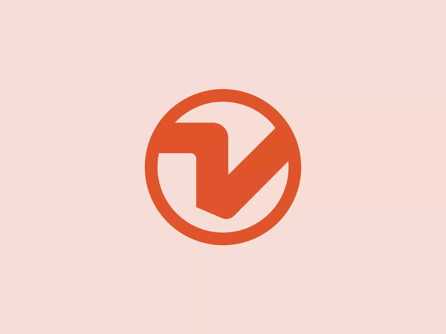 The logo features a bold, stylized "check" or tick mark within a circle. The check mark design conveys a sense of approval, correctness, or completion. Its angular bends give it a dynamic and modern feel. The color of the logo is a strong, burnt orange that suggests energy and determination. The overall design aesthetic is minimalist and clean, suggesting efficiency and straightforwardness. Practicing restraint, the Wingtra logo foregoes any additional embellishments, allowing the symbol to stand out prominently.