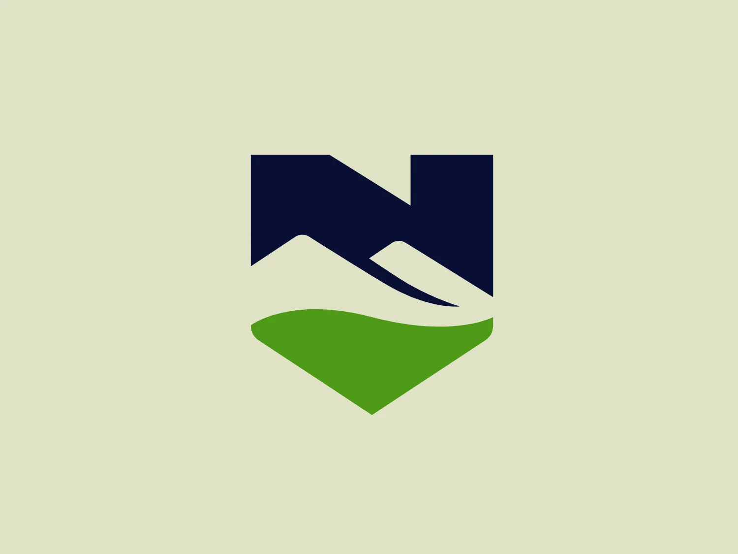 The logo for Northern Vermont University showcases a stylized letter "N" with a dynamic, geometric design. The upper part of the "N" is rendered in a deep navy blue color, while the lower complementary shape is a vibrant green hue. The design consists of angular lines and planes, evoking a modern and progressive vibe. This gives the impression of an abstract mountain peak, symbolizing growth or upward movement, with the green shape potentially representing a foundational base or ground. The interaction between these two elements suggests balance and stability. The clean lines and bold colors establish a strong visual identity that is both simple and memorable.
