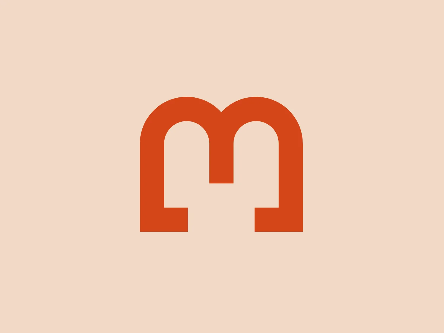 The Magnes Museum logo features a stylized letter 'M' with rounded edges, creating a modern and approachable look. The character is designed using a bold, sans-serif typeface, enhancing its readability and impact. The vivid orange color conveys energy, creativity, and enthusiasm, creating a vibrant logo. The simplicity and symmetry of the design give it a timeless characteristic and a sense of balance and stability.