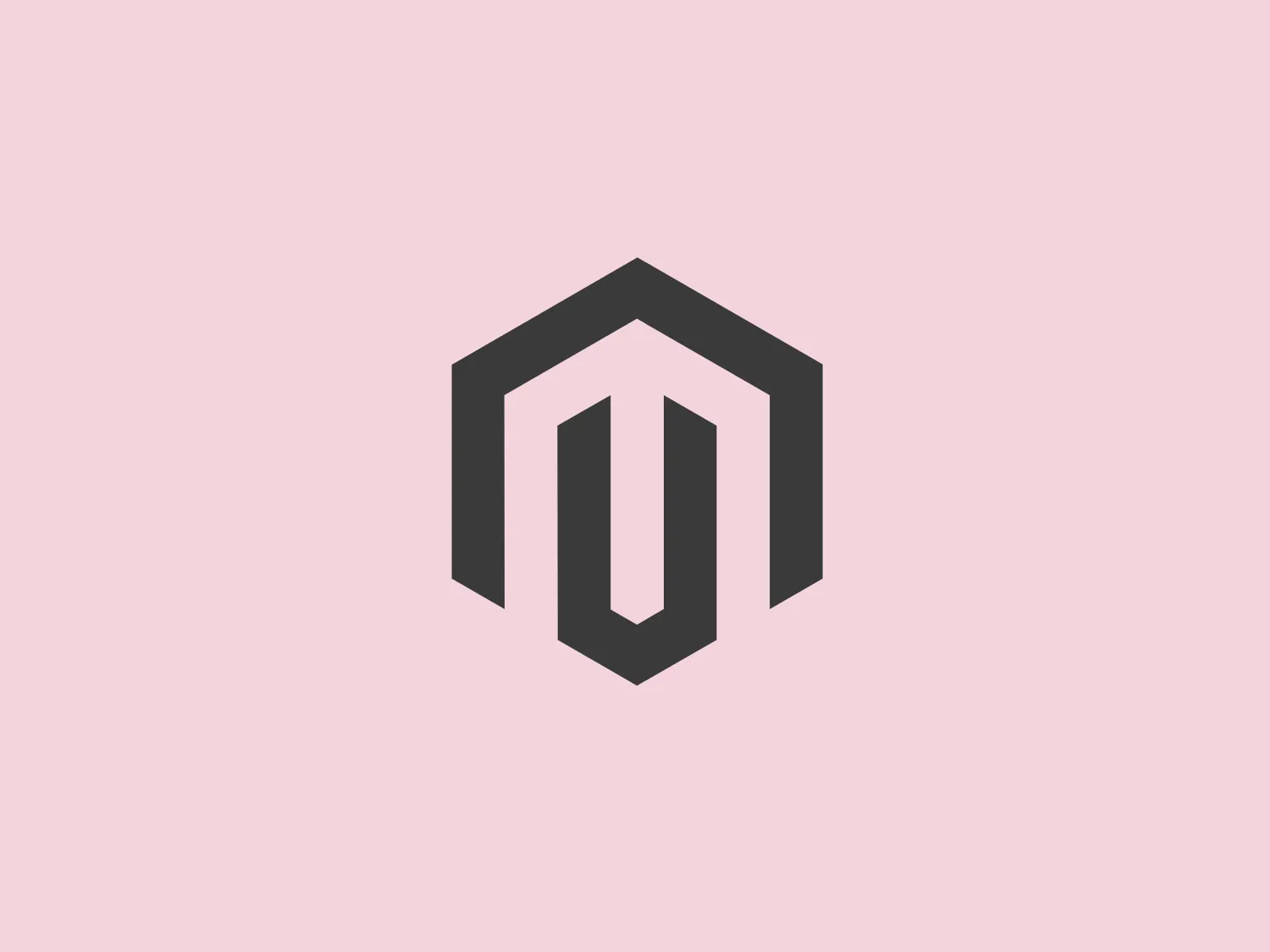 The Magento logo features a sharp, geometric design with a three-dimensional hexagonal shape pointing upwards or downwards, depending on perspective. It consists of an orange color palette with shadows that create the illusion of depth. The design is modern, minimalist and is likely to represent stability or progress due to its upward-arrow-like appearance. The lines are clean and the logo has a sense of symmetry, with the use of negative space to differentiate the elements of the hexagon.