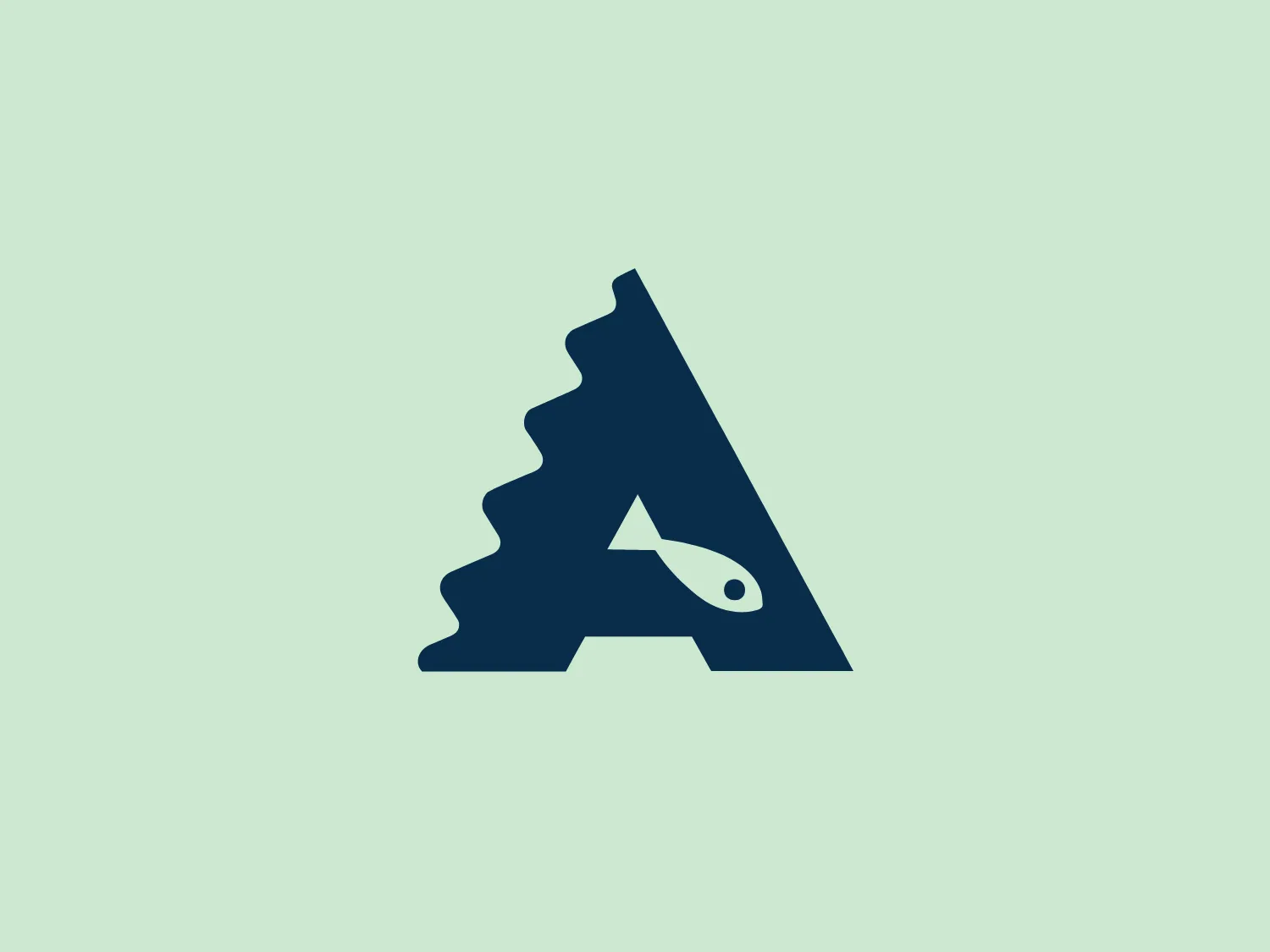 The New Jersey State Aquarium logo consists of a stylized letter "A," with a design that combines elements resembling a tree and a fish. The body of the "A" resembles the trunk and branches of a tree, while the inner white space forms the outline of a fish, swimming upwards within the letterform. The monochromatic dark navy blue color scheme gives the logo a professional and sophisticated look.