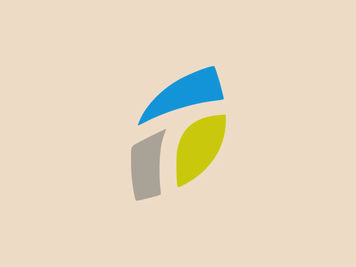 The Telefèric de Montjuïc logo consists of three abstract shapes arranged in a triangular composition pointing clockwise. The top shape is a rich, solid blue, followed by a grey form on the bottom left and a vibrant yellow on the bottom right, evoking a sense of energy and reliability. The design is modern, with clean lines and flat colors, giving it a minimalist and contemporary feel. The shapes themselves are geometric and slightly curved, indicating movement and progression.