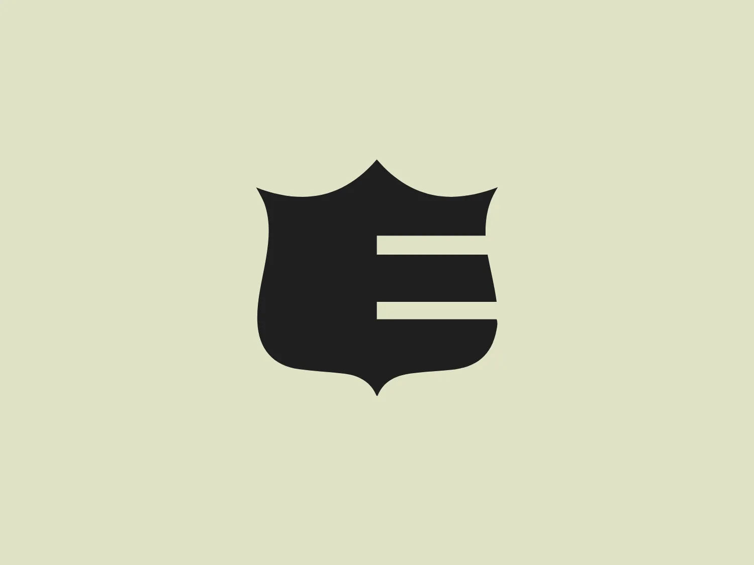 The Mutual Enumclaw logo features a bold, dark green emblem with three horizontal white stripes. The emblem shape is a stylized shield with soft curves and pointed tips at the top and bottom. The overall aesthetic is modern and minimalistic, with the stripes creating a sense of movement or progression. The use of green could signify growth, vitality, or a connection to nature. The crisp lines and solid fill of the emblem provide a striking contrast against the white stripes.