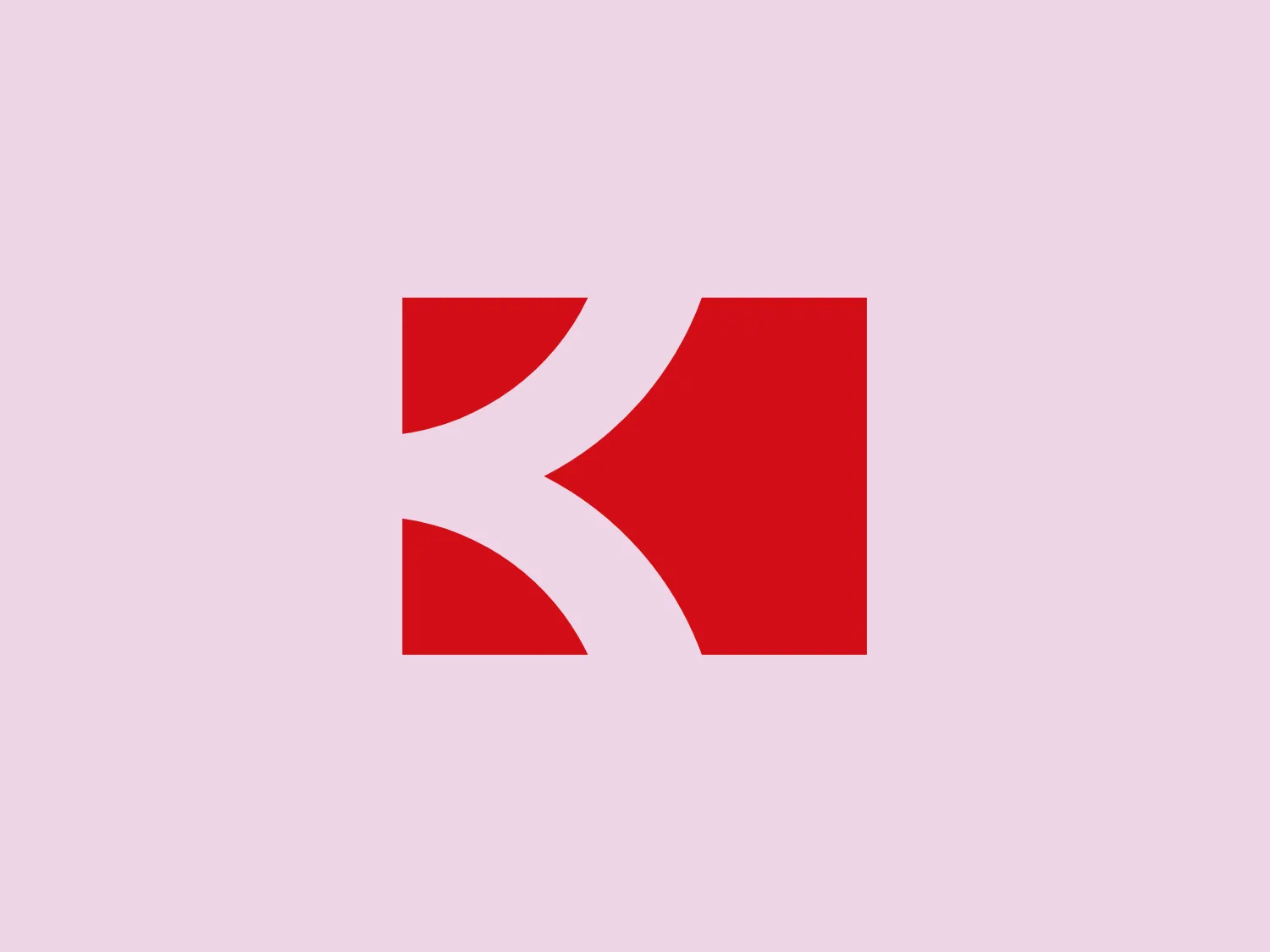 The logo for Loja Kildare is a modern, clean design consisting of a bold and stylized letter "K." It features a striking red color with clear cutouts that create dynamic white spaces, giving the impression of forward motion or pivoting. The design is minimalist, utilizing sharp angles to convey a sense of precision and professionalism. The simplicity of the logo makes it versatile for various applications, and the contrast between the red and the white spaces adds visual interest.