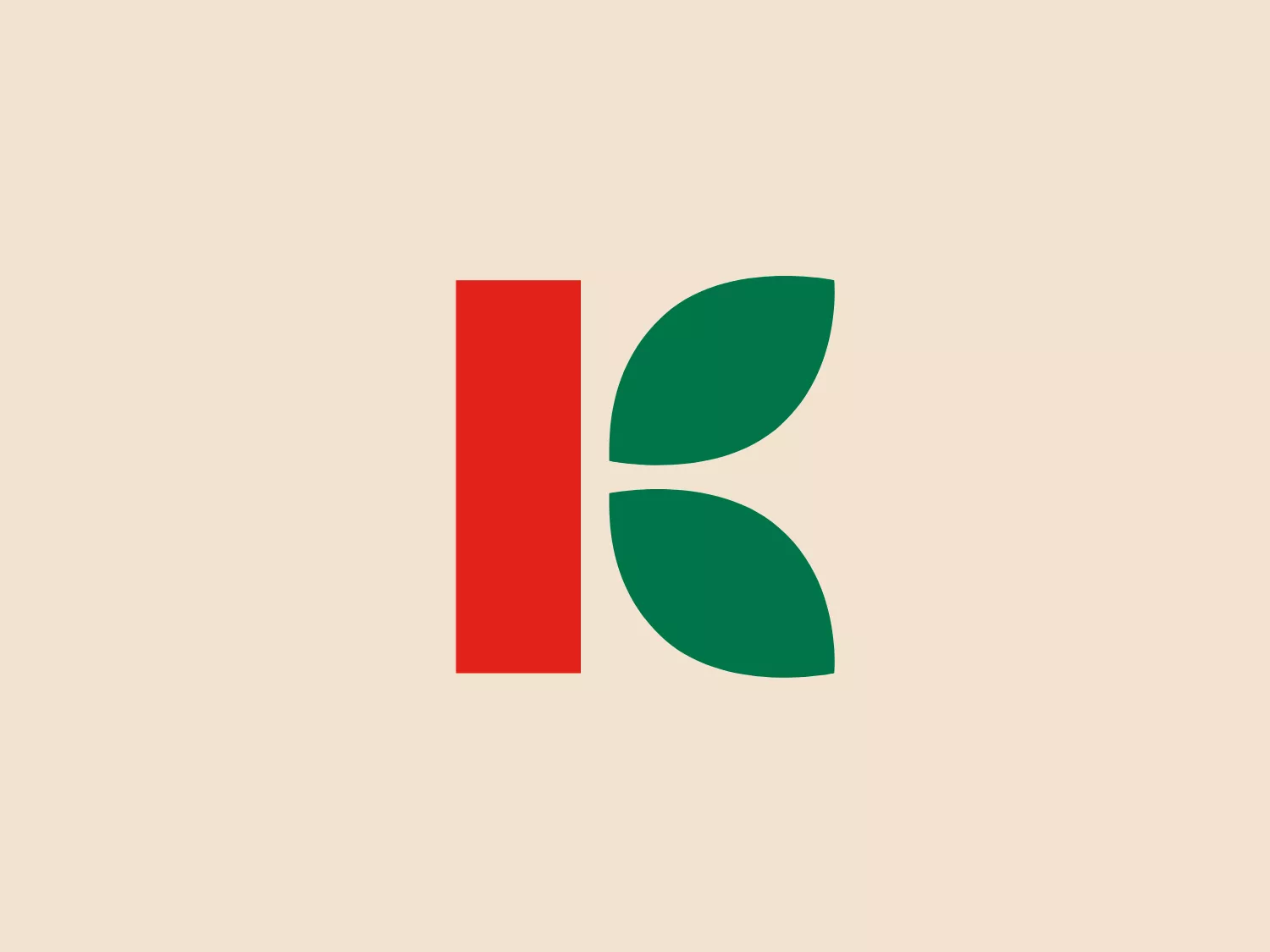 The Karusel logo consists of two distinct shapes with bold colors; a bright red rectangle positioned to the left, and two connected green semi-leaves or semi-petals to the right, forming an abstract representation of the letter "K." The design is simple, modern, and organic, with the contrast between the red and green creating a visually striking effect. The smooth curves of the green elements balance against the stark straight edges of the red rectangle, suggesting a blend of nature and structure.